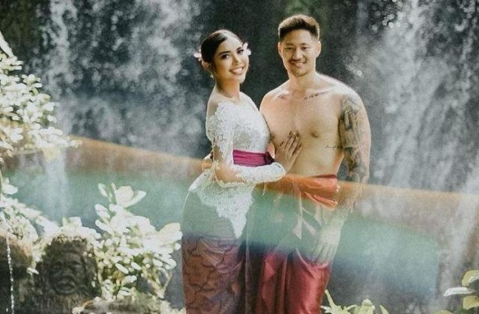 Millen Cyrus bersama kekasihnya, Lionel Lee