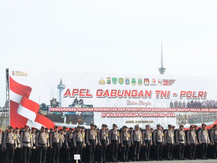 Apel pengamanan Pilkada DKI Jakarta di Silang Monas, Jakarta. Senin (25/11/2024).