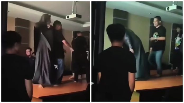 Tangkapan layar ASN PUPUR Kutai Timur saat berjoget sambil pesta miras di atas meja kantor.
