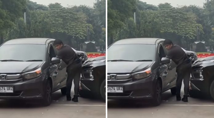 Tangkapan layar video aksi dua pria yang diduga menggesek nomor rangka kendaraan di kawasan Gelora Bung Karno (GBK), Jakarta Pusat.